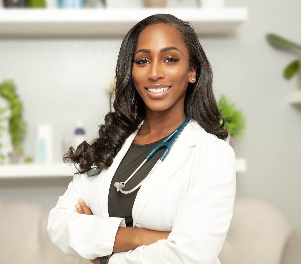 Dr. Alexandria Lightning in a white coat with a stethoscope